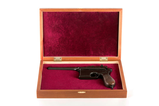 Mauser in gift box on white background