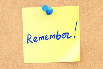 Remember text on a sticky note pinned to a corkboard. 3D renderi