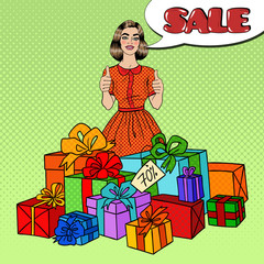 Pop Art Beautiful Woman with Huge Gift Boxes, Thumbs Up and Comic Speech Bubble Sale. Vector illustration