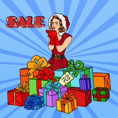 Pop Art Woman in Santa Hat Blowing Snow on Christmas Sale. Vector illustration