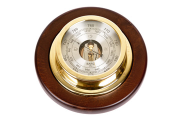 Vintage wooden wall barometer on a white background