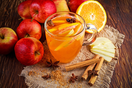 Hot Mulled apple cider with cinnamon, cloves, anise and Orange