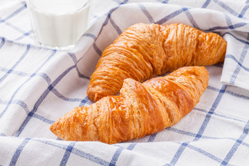 croissant with a glass of milk