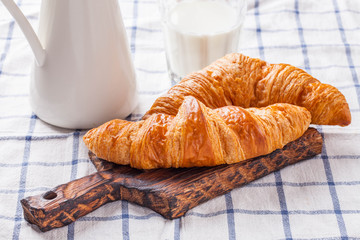 croissant with a glass of milk