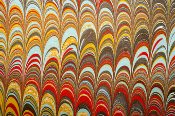 Ebru art. Traditional Turkish Ebru technique. Painting on water, followed by paper prints. Color paint ebru with waves and tile pattern.