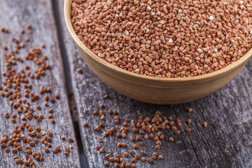 Buckwheat with a wooden spoon