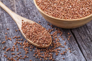 Buckwheat with a wooden spoon