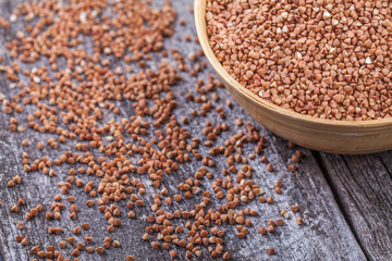 Buckwheat with a wooden spoon