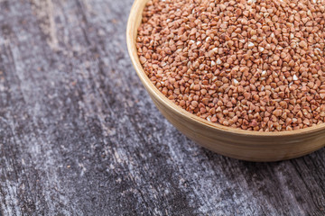 Buckwheat with a wooden spoon