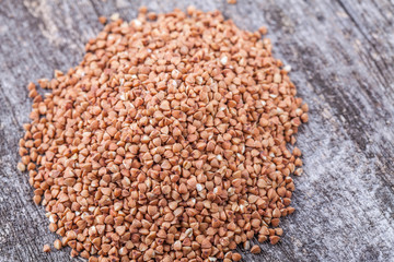 Buckwheat with a wooden spoon