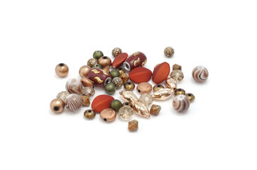 Decorative colorful beads scattered on white background - accessories for handmade and hobby