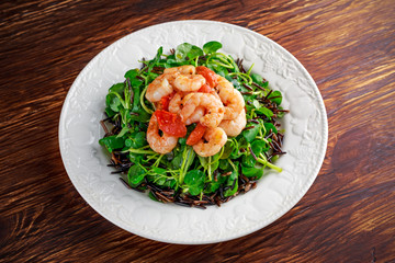 Fresh Healthy Prawns black rice salad on white plate