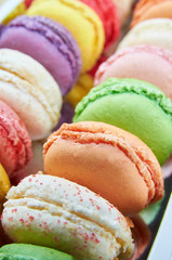 Colorful french macaroons in a box
