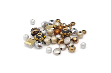 Decorative colorful beads scattered on white background - accessories for handmade and hobby