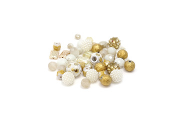 Decorative colorful beads scattered on white background - accessories for handmade and hobby