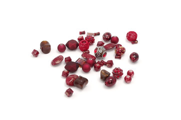 Decorative colorful beads scattered on white background - accessories for handmade and hobby