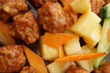 Sweet and sour pork meatballs with pineapple
