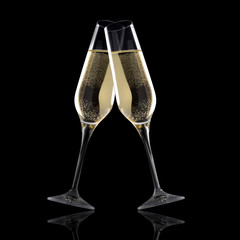 Glasses of champagne isolated on a Black background