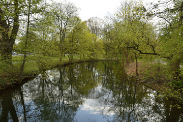 River in a city park in Hanover, Germany, in spring.