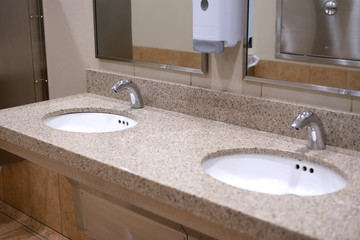 Fototapeta premium Clean new public toilet room empty