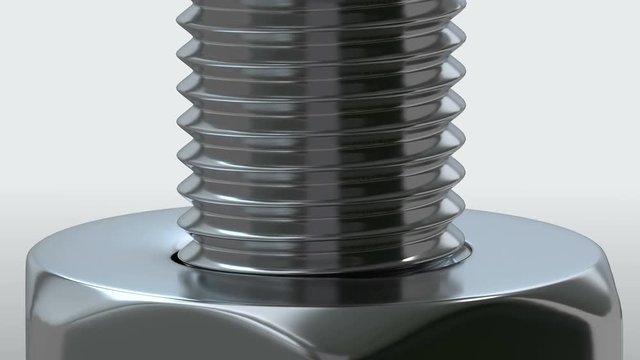 Macro shot of rotating screw and nut. Loop ready animation of moving screw.
