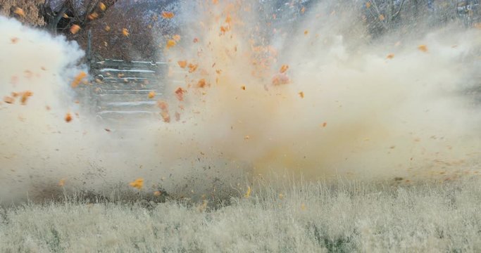 Exploding pumpkins rural farm fun slow motion. Shot with a high powered rifle. Rural farm field entertainment. Autumn after Halloween. Destruction of fresh fruit and vegetables.