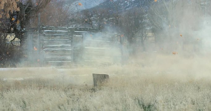 Pumpkin blasting rural Thanksgiving fun reverse. Pumpkin jackolantern exploding after being shot with a high powered rifle. Rural farm field entertainment. Autumn after Halloween.