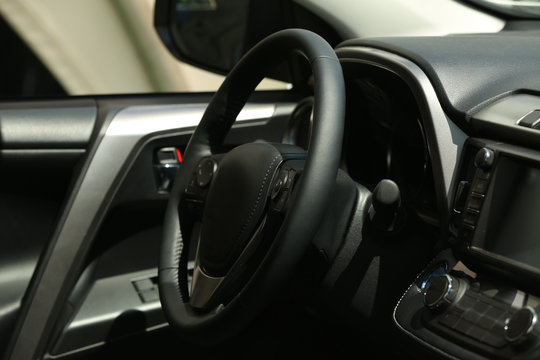Steering wheel in car interior
