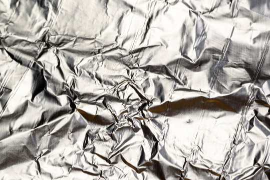 Crumpled Aluminum Tin Foil Surface Background