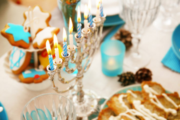 Close up view of menorah on table served for Hanukkah