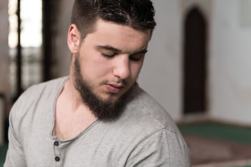 Young Muslim Guy Praying