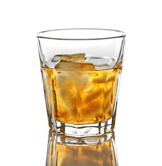 Glass of whisky with ice isolated on white