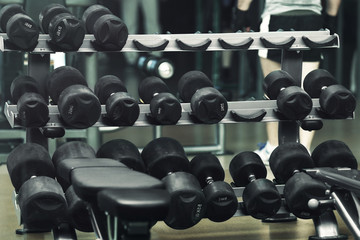 Obraz na płótnie Canvas Set of dumbbells in gym