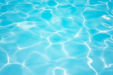 Fototapeta na wymiar Beautiful gentle wave and water surface in swimming pool