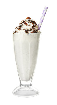 Tasty milk shake with chocolate topping on white background