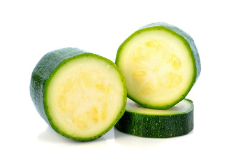 green zucchini vegetables isolated on white