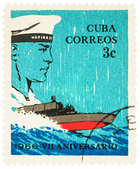Sailor and motorboat on postage stamp