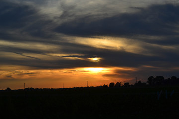 Obraz premium Fall Sunset with Dark Clouds