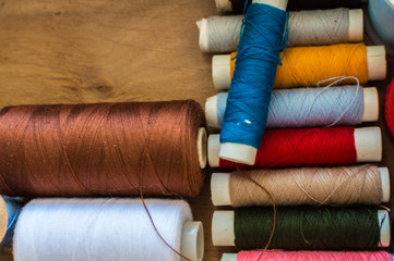 Fototapeta na wymiar Sewing threads multicolored closeup
