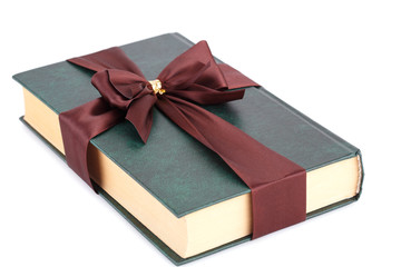 Book with brown ribbon