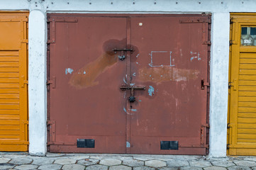 Old metal color garage door.