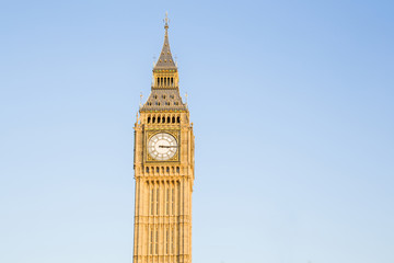 Fototapeta na wymiar Clock tower Big Ben on the blue sky background in London United Kingdom.