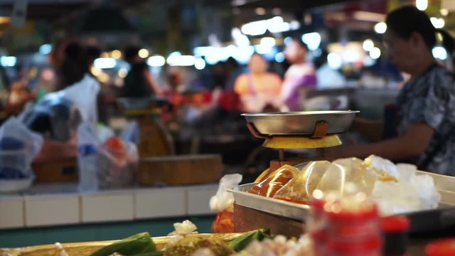 Thailand local wet market. Video scene Thai people walking and shopping