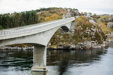 mountain road countryside, stone bridge across the bay