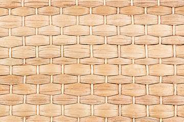 Bamboo woven beige mat handmade background. Wicker wood texture. Horisontal strips.