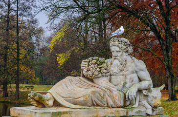 a beautiful sculpture in the autumn Lazienki Krolewskie Park, Warsaw, Poland.