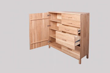 Oak chest of drawers on a light background
