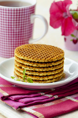 Waffles with caramel, tea and Petunia 