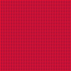 Red background of small hearts knitted fabric