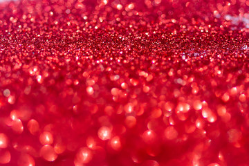 Red Sparkling Glitter bokeh Background.